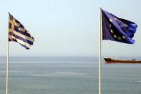 The Greek and European Union flags shredded. Photo: Iako